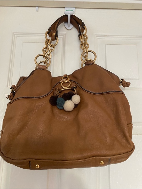 Juicy Couture Handbags - Juicy Couture Brown Leather Shoulder Bag with Pom-Pom Charm